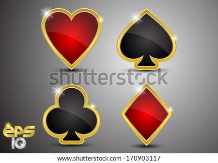 On a gray background red and gold and black and gold card suits