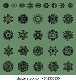 On a green background. Celebratory vector set with 29 snowflakes. Vector illustration.