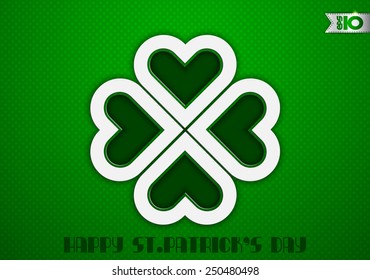 On a green background white clover paper