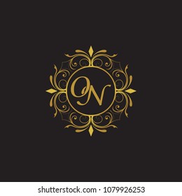 ON Initial logo. Ornament ampersand monogram golden logo black background