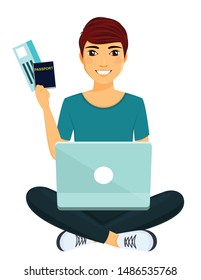 On the lap of a guy's laptop and he holds in his hands the tickets and the passport. Plan your vacation online. Work, education and entertainment via the Internet. The guy sits with a laptop on his la