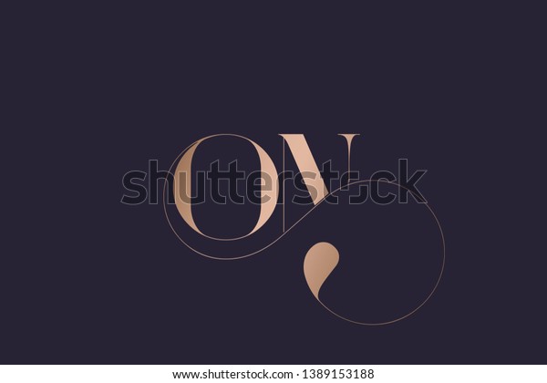 ON logo monogram.Typographic icon with letter o\
and letter n. Serif lettering and decorative swirl. Alphabet\
initials sign in rose gold metallic color isolated on dark\
background.Modern, luxury\
style.