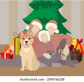 On New Year's, the little family celebrates Christmas with their sweet dog. A warm atmosphere with a Christmas tree and Christmas boxes. Vector illustration.
