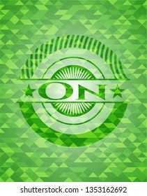 On realistic green mosaic emblem