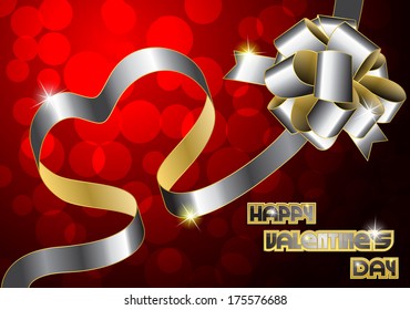 On a red background silver and gold ribbon and heart shaped bow