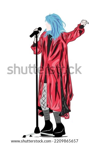 On stage against a white background, a female singer with a microphone, a long red dress, and blue hair performs.