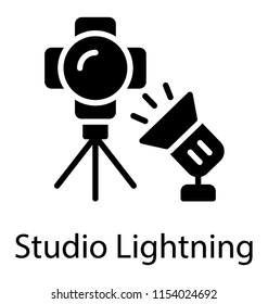 
On a stand lense is placed and heavy bulb lightning it, studio light icon

