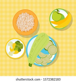 On the table on the tablecloth are plates with porridge, fruits and vegetables