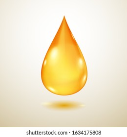One big realistic translucent water drop in yellow colors with shadow
