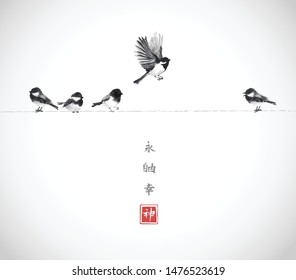One bird flying and four little birds sitting on a wire. Traditional oriental ink painting sumi-e, u-sin, go-hua on white background. Hieroglyphs - eternity, freedom, happiness, spirit