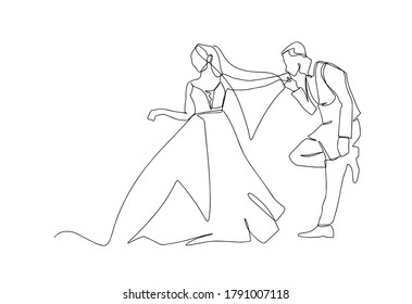 una boda continua de línea trazada a partir de la silueta de la imagen de la mano. Los personajes de la novia y el novio del marido y la mujer están casados. Besos a mano.