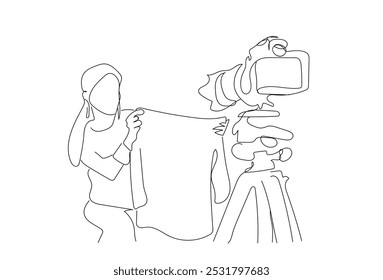 One continuous line. Blogger female character. Internet blogging, online broadcasting. Influencer media blogger recording video for blog.  Hand made vector not AI.