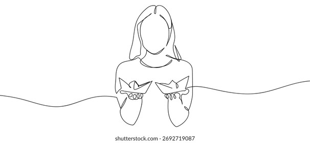 One continuous line design of a woman holding a paper boat. simple linear style Doodle vector illustration