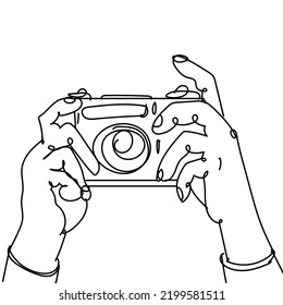 One continuous line drawing 2 hands holding the camera and ready to photograph objects. Single line drawing design vector illustration