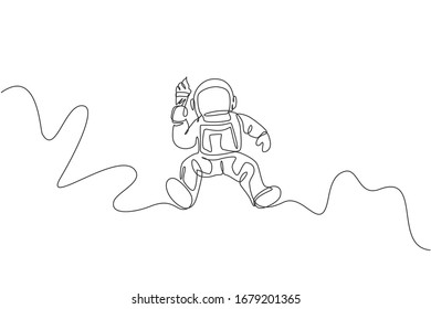 One continuous line drawing of cosmonaut flying and eating sweet cold cone milk ice cream in galactic. Fantasy outer space astronaut life concept. Dynamic single line draw design vector illustration