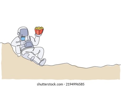 One continuous line drawing of cosmonaut laying relax on moon surface eat french fries and drinking soft soda. Fantasy outer space astronaut life concept. Single line draw design vector illustration