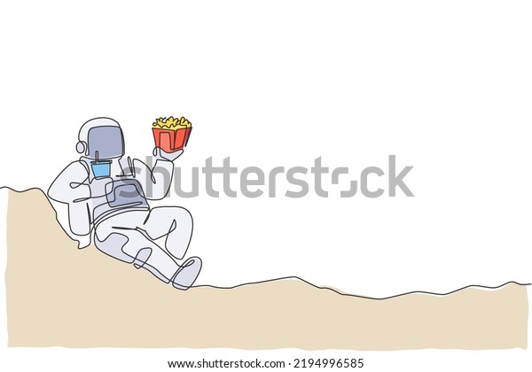 One continuous line drawing of cosmonaut
laying relax on moon surface eat french fries and drinking soft
soda. Fantasy outer space astronaut life concept. Single line draw
design vector illustration