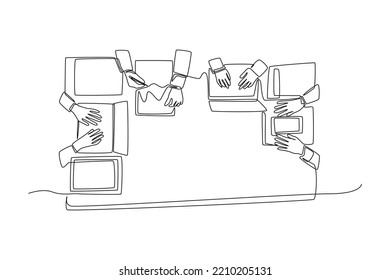 One continuous line drawing of coworkers and business team working together at the office desk from top view. Coworking concept. Single line draw design vector graphic illustration.