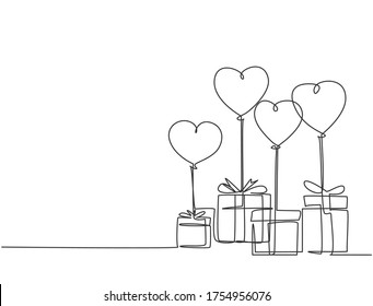 One continuous line drawing of cute gifts box tied with ribbon tape and flying heart shaped gas balloon. Romantic marriage proposal gift concept single line draw design graphic vector illustration