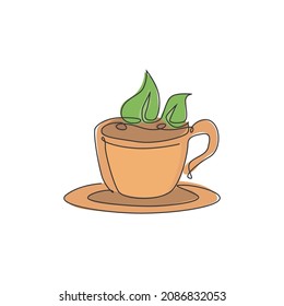 One continuous line drawing of fresh hot cup of tea with green natural tea leaves logo emblem. Beverage store and cafe logotype template concept. Modern single line draw design vector illustration