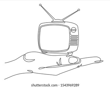 One continuous line drawing of hand holding Retro TV. Vector illustration