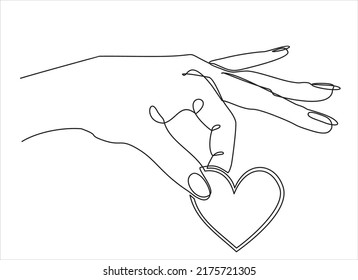 One continuous line drawing of hand holding heart.vector illustration