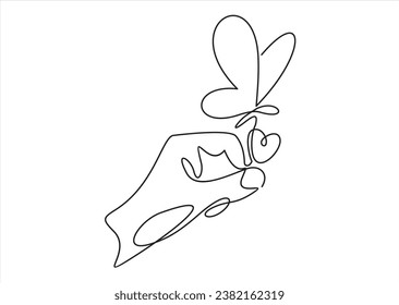 One continuous line drawing of hand holding butterfly. Beautiful flying moth for wellbeing beauty or spa salon logo in simple linear style. Editable stroke. Doodle outline vector illustration
