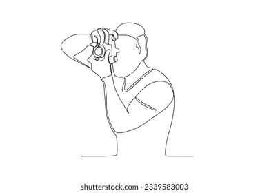 One continuous line drawing of a male photographer taking photo from the left side
