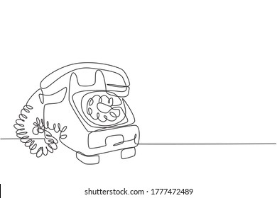 One continuous line drawing of old vintage antique analog desk telephone to communicate. Retro classic telecommunication device concept single line draw graphic design vector illustration