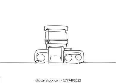 One continuous line drawing of old retro vintage analog slr camera with kit lens from top view. Vintage classic photography equipment concept single line draw design vector illustration graphic
