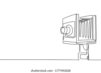 One continuous line drawing of old antique retro film camera medium format. Vintage classic antique photography equipment concept single line draw design graphic vector illustration