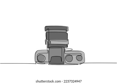 One continuous line drawing of old retro vintage analog slr camera with kit lens from top view. Vintage classic photography equipment concept single line draw design vector illustration graphic