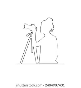 Un dibujo de línea continua de un fotógrafo está sosteniendo una cámara para tomar una buena imagen vectorial. Diseño con diseño minimalista lineal negro. temas de fotógrafos para el diseño de activos.