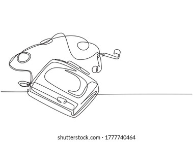 One continuous line drawing of retro old classic mobile radio tape with earphone. Vintage mobile music player item concept single line draw graphic design vector illustration