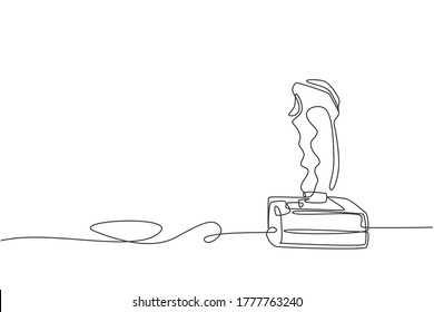 One continuous line drawing of retro old classic console video game joystick. Vintage arcade game controller item concept single line draw design graphic vector illustration
