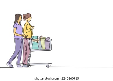 One continuous line drawing two young beauty happy woman shopping and pushing trolley together at supermarket to buy daily organic products. Shopping concept. Single line draw design illustration