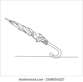 One continuous line drawing of umbrella . single line design of folded umbrella. folded umbrella outline illustration. Editable outline
