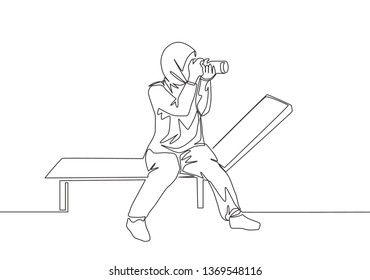 One continuous line drawing of young pretty happy muslimah with veil sitting on chair with camera. Beautiful Asian woman in trendy hijab fashion concept single line draw design vector illustration