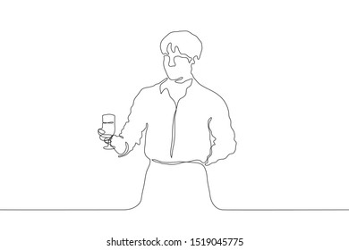 One continuous line drawing. A young attractive man holds a glass with a drink in his right hand, the left is laid behind. Waiter in a shirt and apron. It can be used for animation. Vector