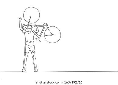 One continuous line drawing of young sporty man bicycle racer lift his bicycle up to celebrate winning. Road cyclist concept. Single line draw design vector illustration for cycling competition poster