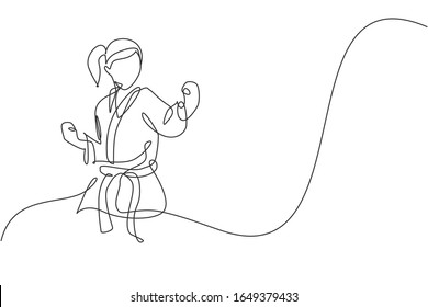 One continuous line drawing young talented karateka girl train pose for duel fighting at dojo gym center  Mastering martial art sport concept  Dynamic single line draw design vector illustration