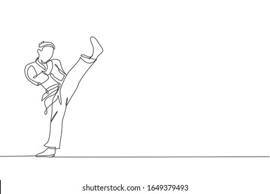 One continuous line drawing of young talented karateka man train pose for duel fighting at dojo gym center. Mastering martial art sport concept. Dynamic single line draw design vector illustration