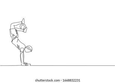 One continuous line drawing of young man soccer freestyler practice keep the ball with feet while handstand in the street. Football freestyle sport concept. Single line draw design vector illustration