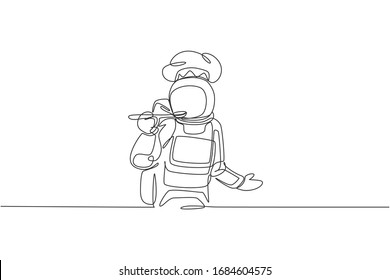 One continuous line drawing of young astronaut chef taste soup sauce while cooking dish for dinner. Healthy cuisine food menu on restaurant concept. Dynamic single line draw design vector illustration