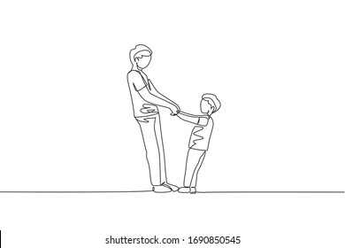 One continuous line drawing of young father and his son holding hands and dancing together at home, family life. Happy parenting concept. Dynamic single line draw design vector illustration graphic