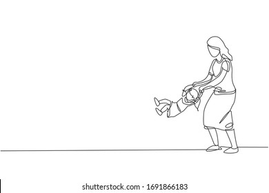 One continuous line drawing of young happy mother playing with her daughter, lifting and swinging at home. Family parenting concept. Dynamic single line draw design graphic vector illustration