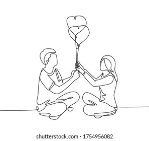 One continuous line drawing of young happy man and woman couple sitting on the couch and holding heart shape balloon together. Romantic dating concept single line draw design vector illustration