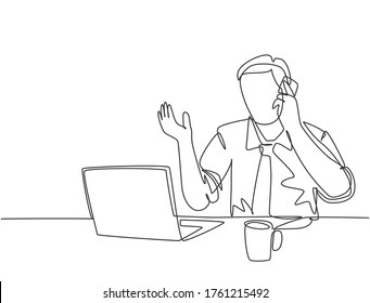 One continuous line drawing of young male manager typing on laptop and receiving a phone call from business colleague. Office work load concept single line draw graphic design vector illustration