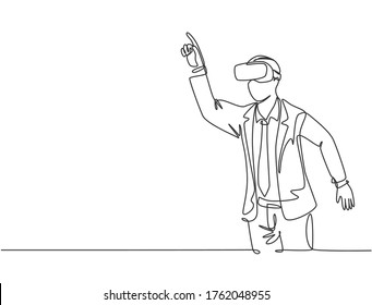 One continuous line drawing of young happy businessman pretending to touch button while wearing virtual reality helmet. Modern futuristic video game concept single line draw design vector illustration