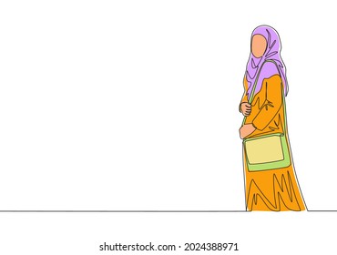 One continuous line drawing of young pretty muslimah on Islamic cloth carrying purse to hangout. Beauty Asian woman model in trendy hijab fashion concept single line draw design vector illustration
